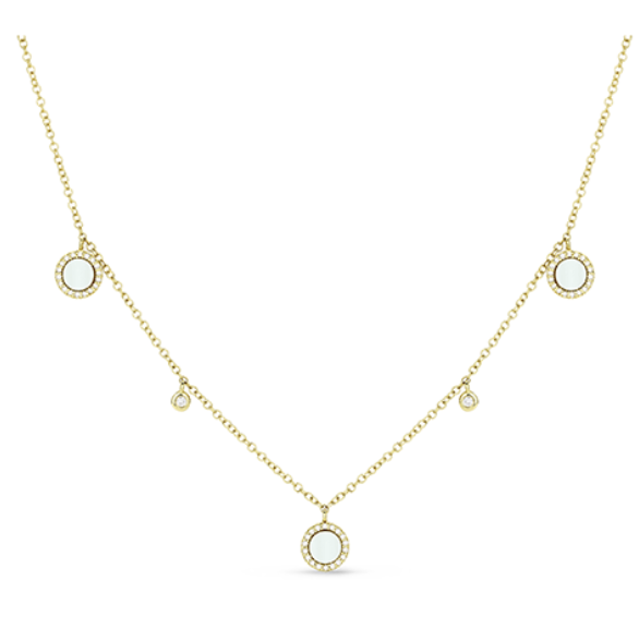 A yellow gold station necklaces with round pearls.
