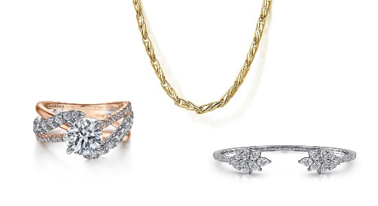 a mixed metal engagement ring, yellow gold chain, and white gold bracelet by Gabriel & CO.